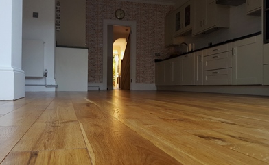 Revitalisation of the kitchen oak floor in Kingston upon Thames